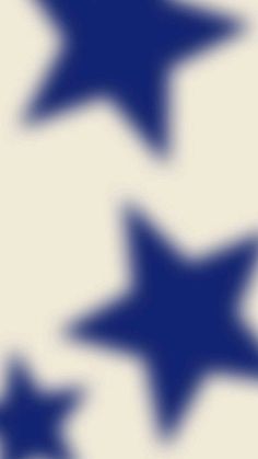 four blue stars on a white background with no image to describe, they appear to be blurry