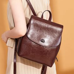 Women's Top Grain Leather Backpack Simple Style City Backpack Natural Cowhide Leather Rucksack Classic Elegant Leather Backpack Model Number: SX886 Dimensions: 9"L x 4.7"W x 10.6"H / 23 cm(L) x 12 cm(W) x 27 cm(H) Weight: 1.87 lb / 0.85 kg Hardware: Silver Hardware Shoulder Strap: Adjustable Color: Brown / Coffee / Black Features: • Genuine Natural Leather• Inside 1 Wallet Pocket, 2 Zipper Pockets.• YKK Zipper• Adjustable Shoulder Strap• Can fit an iPad mini, iPhone, Books, Files, Mini Umbrella, Leather School Bag, Vintage Leather Backpack, Women Backpack Travel, Simple Backpack, City Backpack, Female Shoulder, Leather Rucksack, Backpack Women, Women Travel