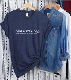 For the person in your life who didn't want a dog, but now they are their favorite person. The text reads:  i don't want a dog.  but we got one anyway and they're my favorite HOW IT WORKS: Pick your color, size, and quantity.    CARE INSTRUCTIONS: Wash warm, inside out with like colors. No iron.  RETURNS + EXCHANGES: We do not accept returns on custom print shirts. Funny Dog Shirts For Dogs, Shirts About Dogs, Dog Shirts For People, Dog Lovers Tshirt, Custom Printed Shirts, Funny Dog Print Crew Neck T-shirt, Dog Shirt, Get One, Dog Owners