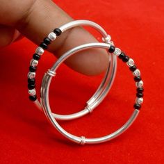 Silver Black Beads Anklets, Adjustable Silver Bangle For Birthdays, Adjustable Silver Bangle For Birthday, Stackable Bangle With Round Beads For Gift, Stackable Bangle With Round Beads As Gift, Gift Stackable Bangle With Round Beads, Adjustable Silver Beads Bangle For Gift, Adjustable Silver Beaded Bangle, Silver Beads Toe Ring Jewelry For Gift