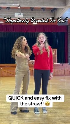 two women standing on a wooden floor in front of a stage with the caption, quick and easy fix with the straw