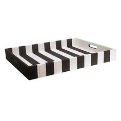 a black and white striped tray with handles