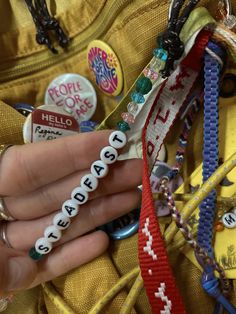 keychains, granola girl, camp, counselor, camp counselor, bracelets, beads Camp Counselor Ideas Cabin, Summer Camp Backpack, Summer Camp Friendship Bracelets, Cool Camp Counselor Aesthetic, Camp Counselor Hair, Granola Keychain, Camp Counselor Backpack, Summer Camp Clothes Aesthetic, Camp Counsler Aesthetic