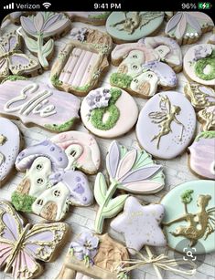 some decorated cookies sitting on top of a table