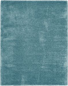 a blue rug with a white border on the bottom and an area that is very soft