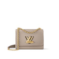 LOUIS VUITTON® - Twist Mm - Galet Lv Twist, Louis Vuitton Official Website, Trunk Bag, Duffle Bag Travel, Louis Vuitton Official, Wallet Pouch, Monogram Bag, Silver Jewelry Fashion, Louis Vuitton Twist