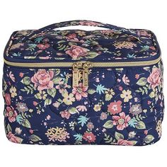 One main compartment with spacious interior Made of polyester with a pink floral pattern on top of a navy blue background Exterior includes a floral polyester top handle for easy carrying Gold-toned hardware includes coil zipper and two metal pullers Interior is fully lined in navy blue polyester material Size 9 x 5.875 x 5.75 inches Pink Floral Pattern, Navy Blue Background, Train Case, Polyester Top, Blue Background, Pink Floral, Top Handle, Makeup Bag, Floral Pattern