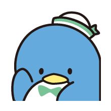 a blue penguin with a green hat on it's head