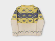 This vintage sweater is a must-have for any young girl's wardrobe. The wool knit fabric in a bold yellow color and abstract design gives off a mod/gogo look that is perfect for casual occasions. The sweater has long sleeves and a chest size of 32 inches, with a size of L for a comfortable fit.  The brand is Miss Erika, and it is an original piece from the 1970s, made in Hong Kong. The sweater is perfect for a young girl who wants to make a statement with her fashion choices. The shoulder to shoulder measurement is 14 inches, and the shoulder to hem measurement is 20 inches. This sweater is a great addition to any vintage clothing collection and will be sure to turn heads. Tag Size: Youth Large  Approximate Flat Measurements:  * Chest: 15.5" * Length: 20" * Material: Wool Condition: No Noti Flaws And All, Reclaimed Vintage, Girls Wardrobe, Vintage Sweater, Wool Knit, Yellow Fashion, Kids Sweater, Knit Fashion, Girls Sweaters