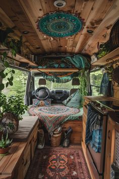 the interior of an old camper van decorated with plants and rugs on the floor