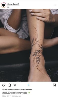 a woman's foot with a tattoo on it