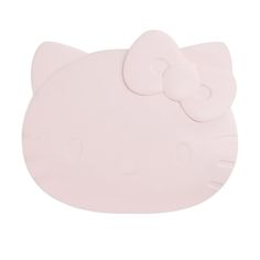 a pink hello kitty shaped plate with a bow on the front and back of it