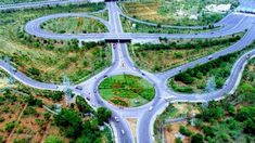 an aerial view of a highway intersection with multiple lanes