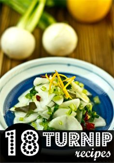 a blue and white plate topped with veggies on top of a wooden table