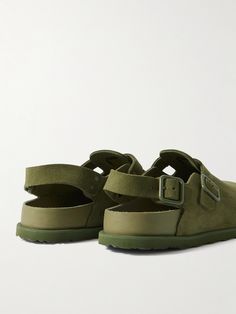 The Birkenstock 1774 line features the label's iconic styles, "reimagined through an artistic lens". Updated with adjustable slingback straps, these 'Tokio VL Cazador' clogs have been made at a specialist factory in Germany with soft suede uppers and signature moulded cork footbeds. Birkenstock 1774, Clogs Birkenstock, Suede Clogs, White Shoes Sneakers, Luxury Sneakers, Driving Shoes, Classic Sneakers, Derby Shoes, Espadrille Shoes