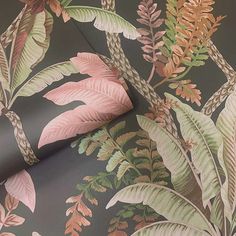 an image of a wallpaper with leaves and plants on it's side,