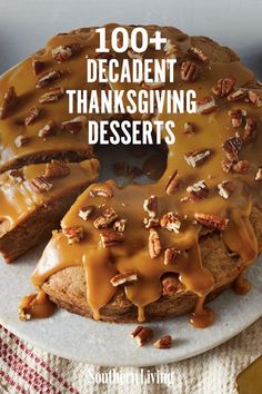 a cake covered in caramel drizzle and pecans with the words, 100 + decadent thanksgiving desserts