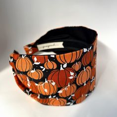 pumpkin  headband  black  background with multishade orange pumpkins  My headbands are approx. 3.25" wide mod style.  They are fitted and do not slip on your head making them perfect for short hair!  One size fits most.  Fabric is attached to a 1" rigid plastic fabric wrapped headband base  Made to order.   Pattern placement varies.  Handmade by me! Sharyl! In my love filled smoke free Tennessee country home.  To see all of my headband styles please click here: Jerseymaid.etsy.com Thanks for stopping by and thank you for supporting handmade.  :)  last 2 photos are for style reference purposes only For customers outside the United States  import taxes, local handling fees, customs charges and VAT are NOT included in the purchase price and are the sole responsibility of the buyer. *$5 flat r Hair Accessories Short Hair, Accessories Short Hair, Fall Hair Accessories, Autumn Hair Accessories, Pumpkin Thanksgiving, Halloween Autumn, Handmade Headbands, Headband Styles, Mod Fashion