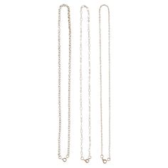 three silver necklaces with chains hanging from the side, one on top of the other