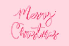 the words merry christmas written in pink ink on a pink background with red and white lettering