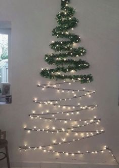 a christmas tree made out of branches and lights