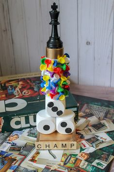 a stack of dices sitting on top of a wooden table