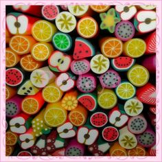 an image of colorful buttons with fruit on them