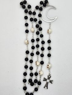 Perfect for spooky season or anytime if you're a goth looking to dress up your wardrobe. This necklace is made from 6mm onyx with 6mm howlite skulls. This is a rosary styled necklace Adjustable Gothic Beaded Necklace As Gift, Gothic Beaded Necklace For Gift, Gothic Rosary Aesthetic, Black Rosary Necklace, Goth Rosary Necklace, Rosary Style Necklace, Goth Look, Rosary Necklace, Crystal Necklaces