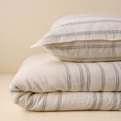 three pillows stacked on top of each other