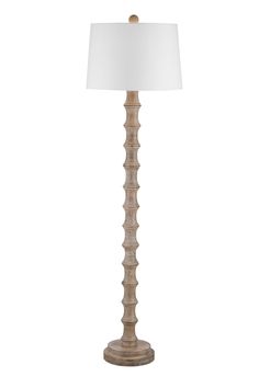 a wooden lamp with a white shade on it