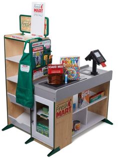 a toy kitchen with various items on it