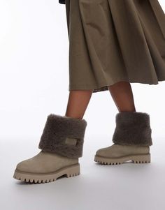 Shoes by Bronx Winter wardrobe staple Fold-down faux fur cuff Pull-on style Branded design Round toe Chunky sole Textured tread Low block heel Over Ankle Boots, Trainer Heels, Jane Dress, Wide Jeans, White Trainers, Maxi Dress Trend, Heeled Ankle Boots, Fold Over, Mini Dress Party