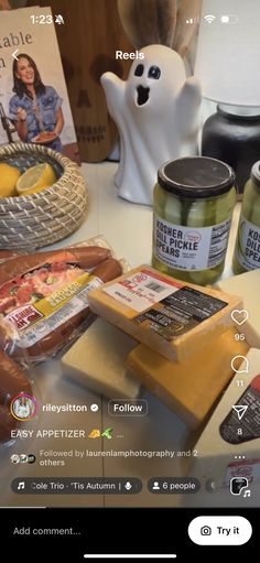 the food is displayed on the table with an instagramr for people to eat