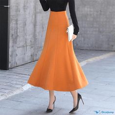 Orcajump - Ladies Midi Skirt with Elegant Flared Design and Intricate Patterns Elegant Orange Skirt For Work, Fitted Orange Skirt, Orange Lined Skirt For Work, Orange Workwear Skirt With Lining, Fitted Orange Pleated Skirt, Orange Lined Skirt For Workwear, Chic Stretch Orange Skirt, Orange Skirt For Work, Elegant Fitted Orange Bottoms