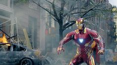 iron man standing in the middle of a city street with fire coming out of his chest