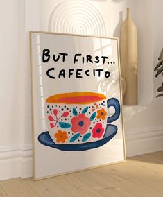 a sign that says, but first cafecito with a teacup on it