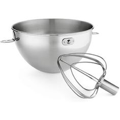 a metal bowl with a whisk in it and a beater on the side