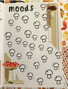 a page in a notebook with mushrooms on it