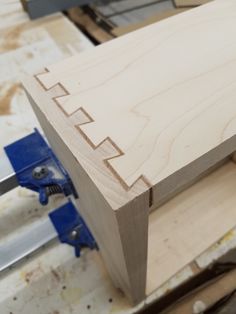 a piece of wood is being worked on