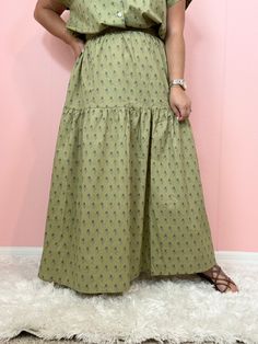 Green Printed Skirt Green Non-stretch Maxi Skirt, Green Cotton Casual Maxi Skirt, Green Cotton Maxi Skirt, Green Flared Skirt Dress For Spring, Green Flowy Maxi Skirt For Day Out, Fitted Green Cotton Maxi Skirt, Chic Green Maxi Length Bottoms, Chic Green Tiered Maxi Skirt, Green Relaxed Maxi Skirt