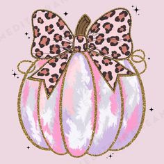 a pink and white pumpkin with leopard print bow on it's side, sitting in front of a pink background