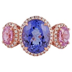 Pink Sapphire - 1.03 Carats Diamond - 0.62 Carat Tanzanite - 3.71 Carat 18KT Gold Pink Sapphire Diamond Ring, 3 Stone Ring, Tanzanite Diamond Ring, Tanzanite Diamond, Pink Sapphire Ring, 3 Stone Rings, Diamond Ring Settings, Sapphire Diamond Ring, Modern Ring