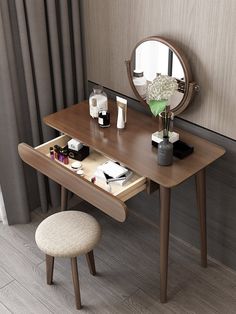 a dressing table with a stool and mirror