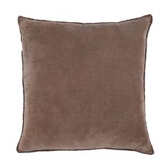 a brown pillow on a white background