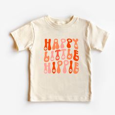 We are loving the fun boho styles that are coming back these days. And is there anything cuter than a little boy or girl sporting this happy little hippie t-shirt! Super soft, polyblend fabric (100% cotton upon request). We use Bella Canvas for most of our shirts. We love the groovy colors and flowers in this shirt. Comes in baby sizes, toddler sizes and youth sizes. Happy Little Hippie Toddler/Baby Shirt, cute kids shirt, trendy, retro toddler, gift, peace, groovy Playful Tops With Funny Print For Playtime, Casual Printed T-shirt For Playtime, Casual Printed T-shirt For Play, Funny Print Tops For Spring Playtime, Playful Summer T-shirt For Playdate, Funny Print T-shirt For Spring Playtime, Playful Funny Print T-shirt For Playtime, Playful T-shirt With Funny Print For Playtime, Unisex Cute T-shirt For Playtime