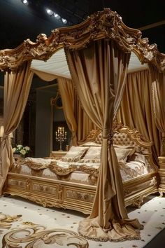 an elaborately decorated gold bed in a room with chandelier and curtains on the ceiling