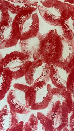 an abstract painting with red and white colors