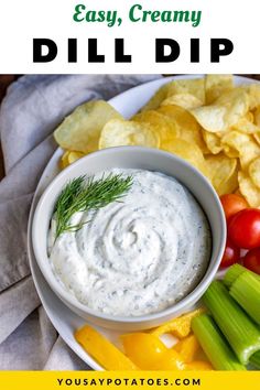 a white plate topped with chips and dip