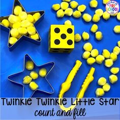 some yellow and black items are on a blue surface with the words twinkle twinkle little stars count and fill