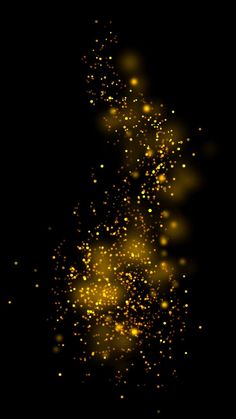 an abstract gold sparkle background on a black background